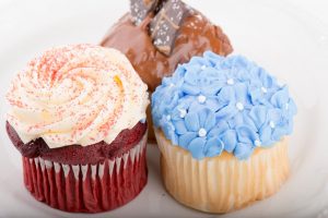 Tasty Pastry Tasty Treats: 3 Flavors of Cupcakes topped with icing