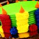 Tasty Pastry Custom Cakes: Round Cake with vivid colored icing in red, yellow, blue, green & orange