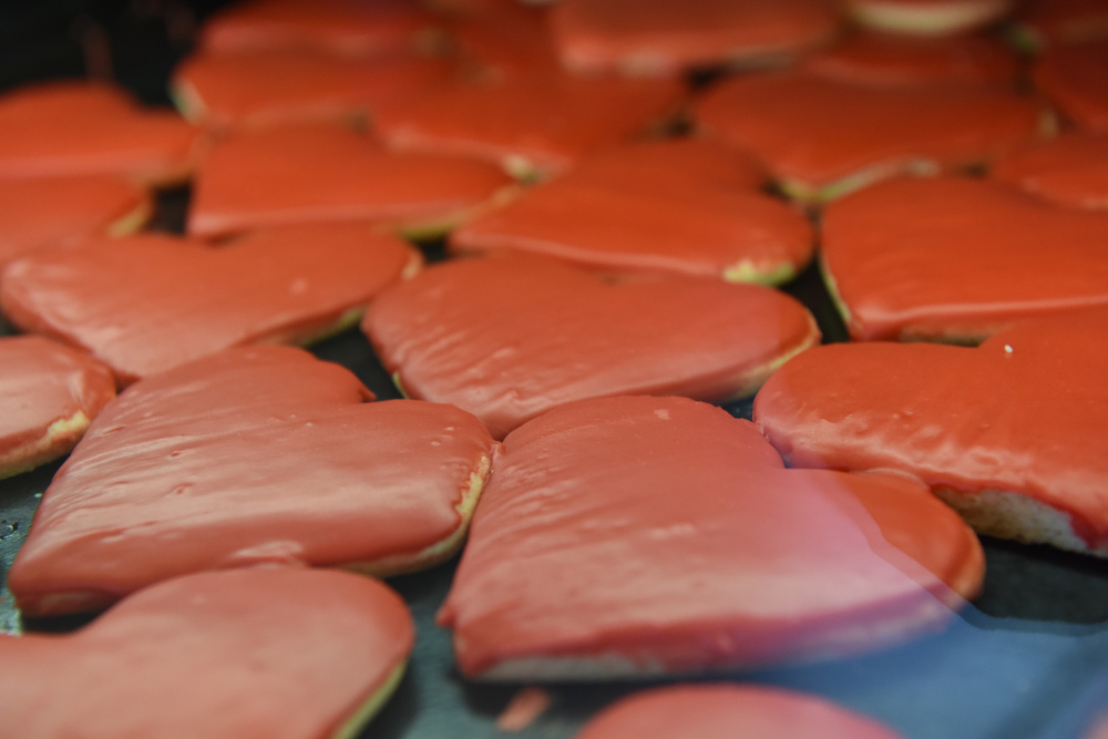 Heart-shaped cookies with red icing | Valentine's Day Treats -- Get Cookies Delivered!