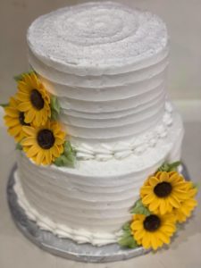 Two-tiered Textured Sunflower Wedding Cake