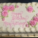 Tasty Pastry Custom Cakes: Birthday sheet cake with white icing and decorated with pink roses and piped white icing