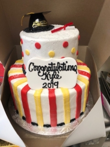 Two-tiered Stripe and Polka Dot Graduation Cake
