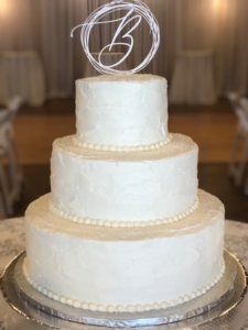Three-tiered Textured Classic White Wedding Cake